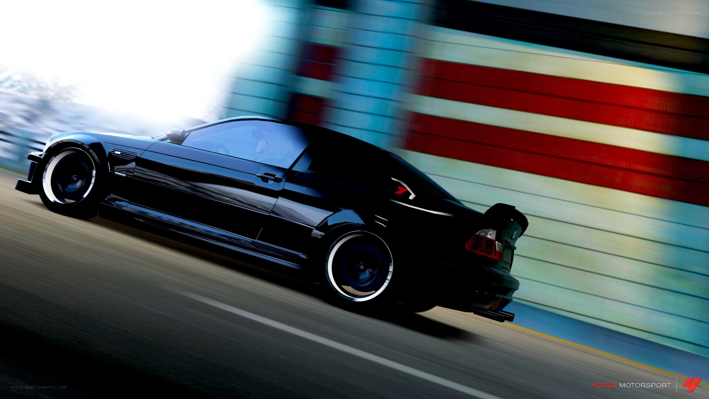 black car racing on track