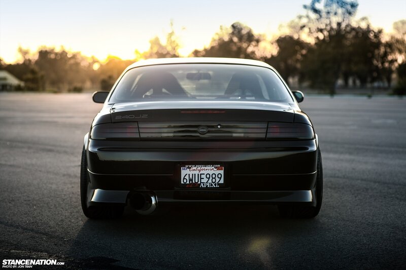 Black Car Rear View — Dramatic, Sunset