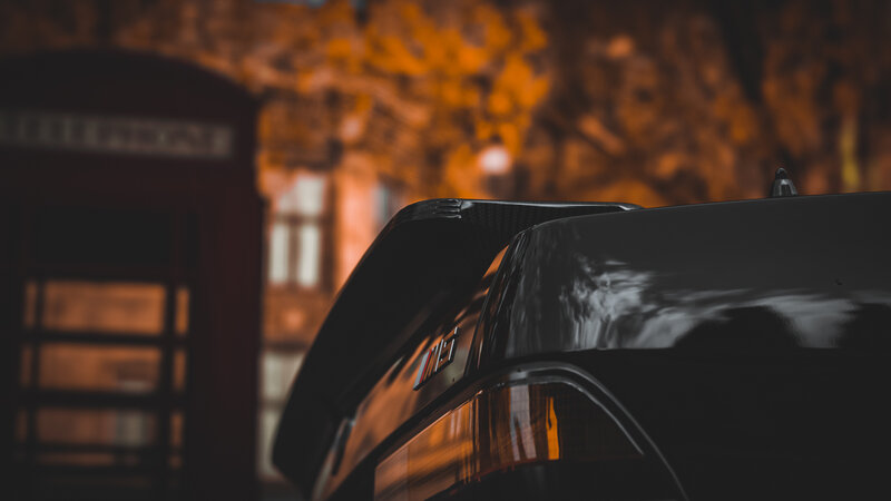 Black Car Rear View — Dramatic