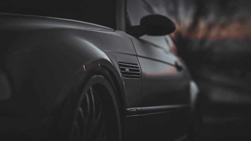Black Car Side Profile — Dramatic