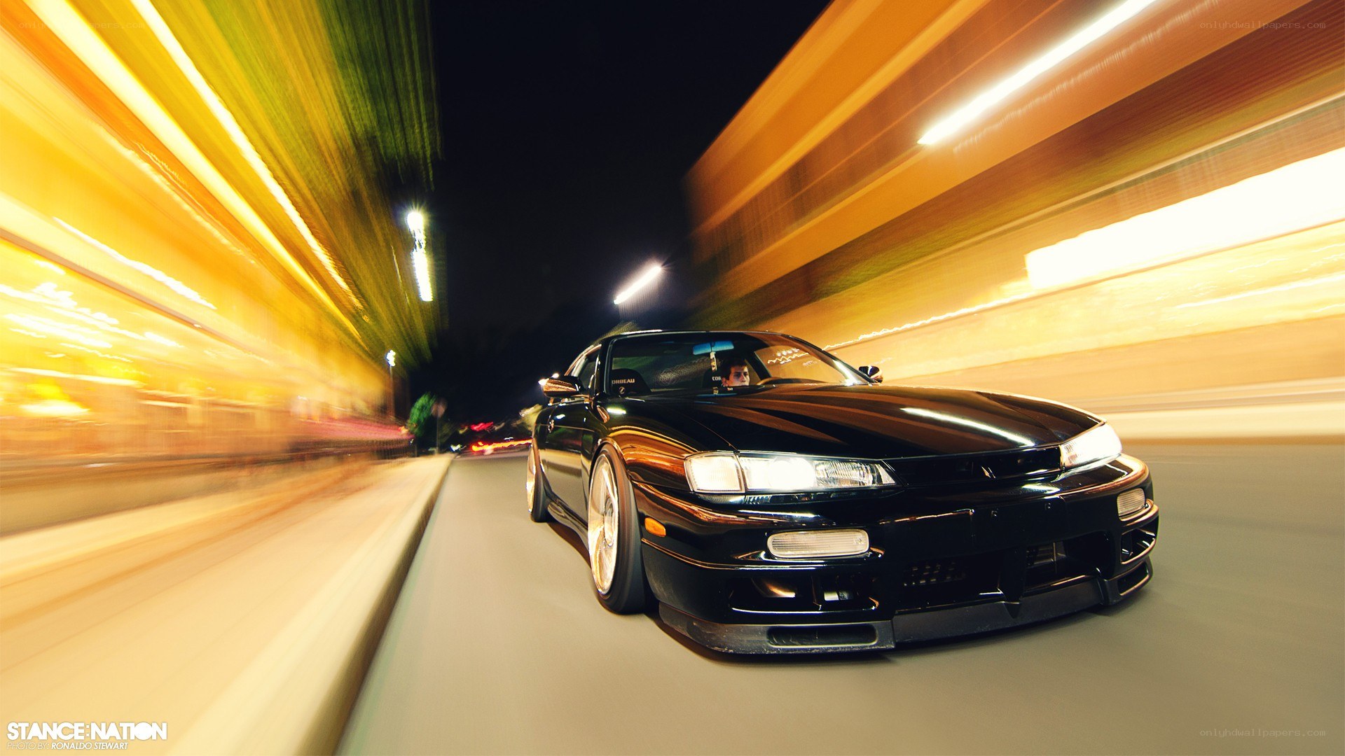 Black car speeding at night