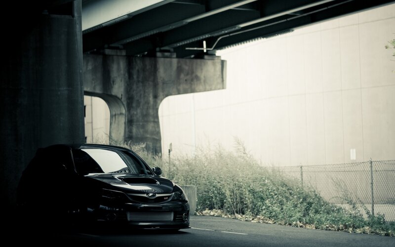 Black Car under Bridge — Dramatic