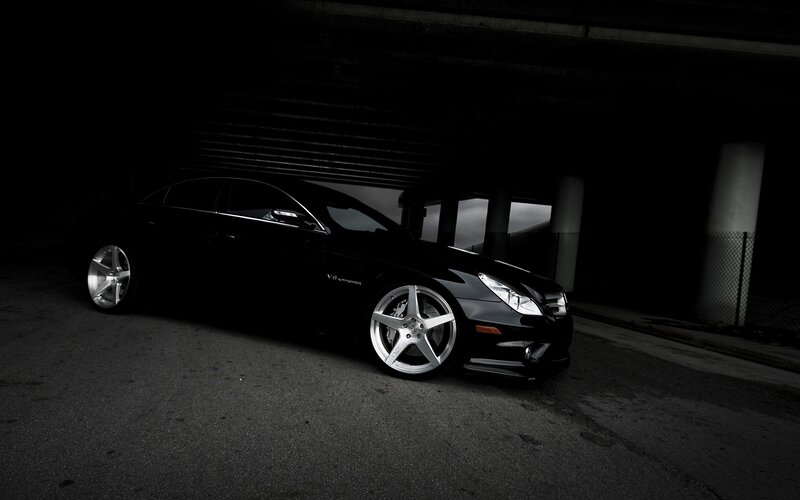 black car under overpass