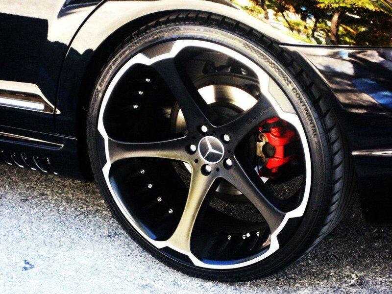 Black Car Wheel — Dramatic, Afternoon