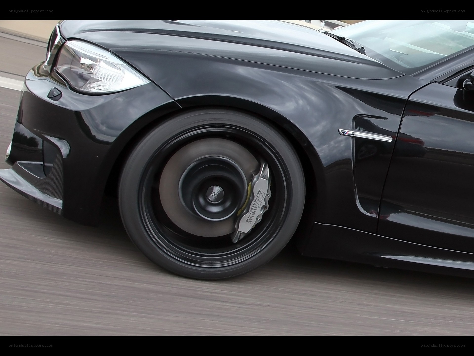 black car wheel in motion
