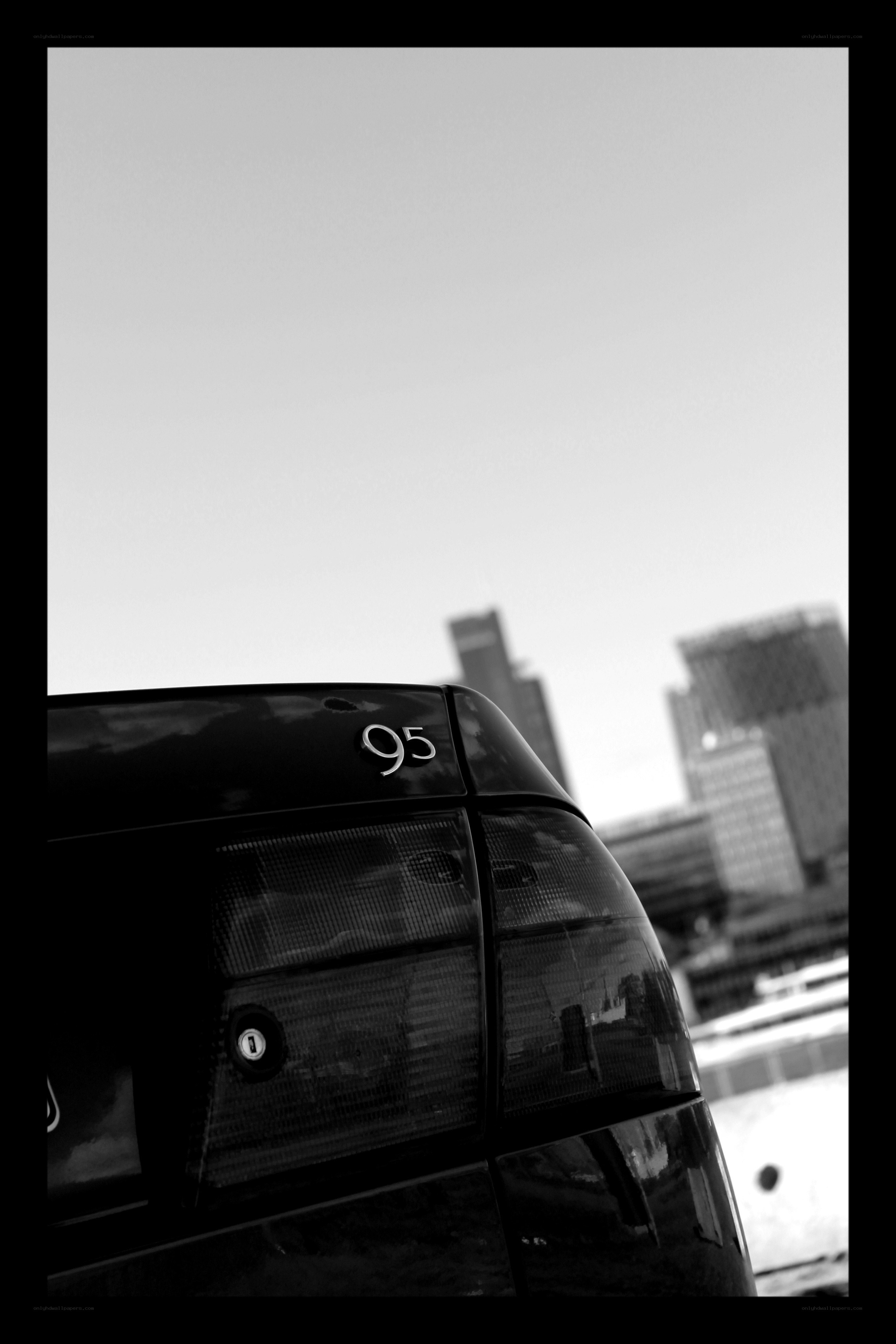 Black car with '95' emblem