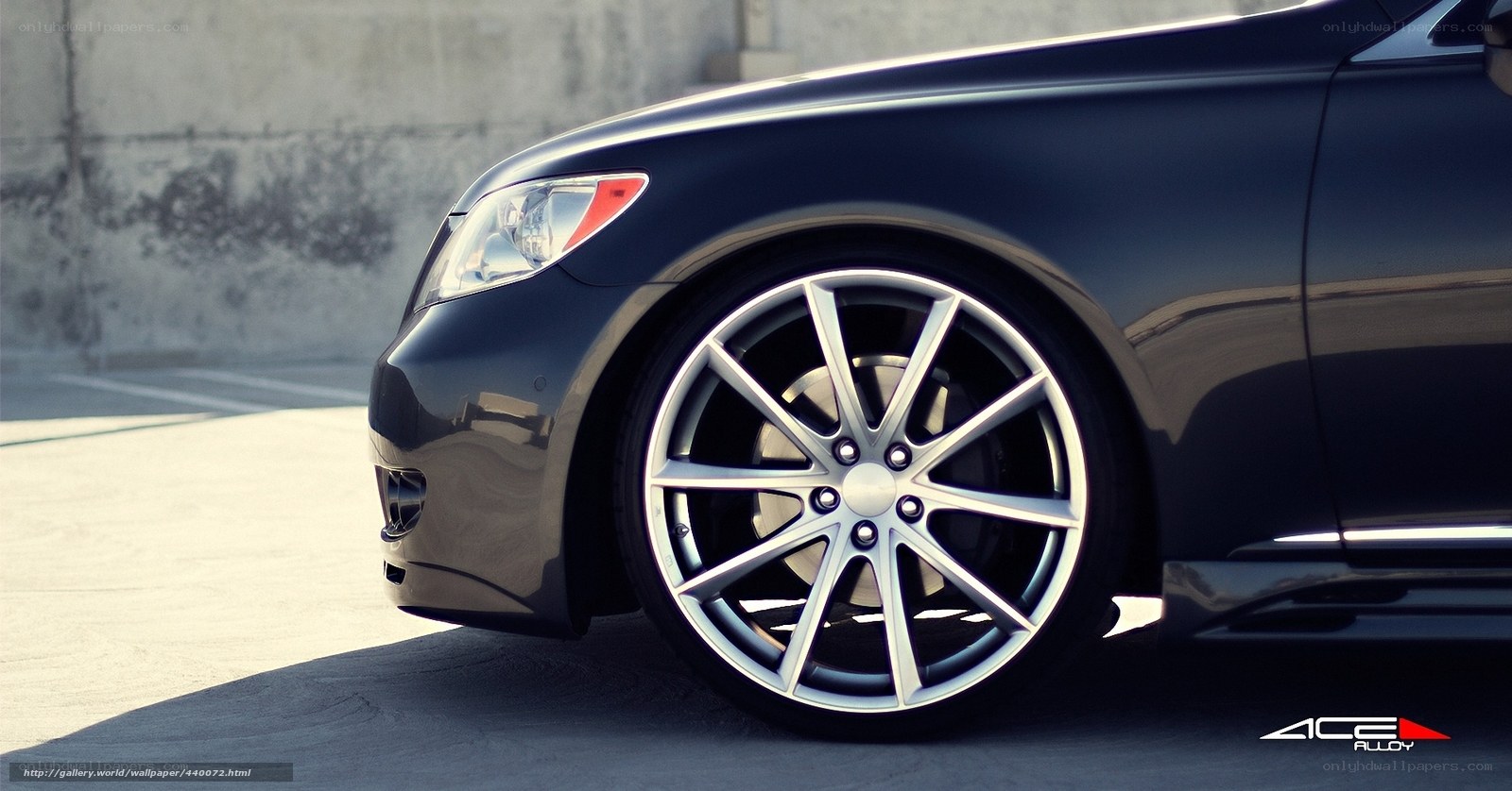 black car with alloy wheels