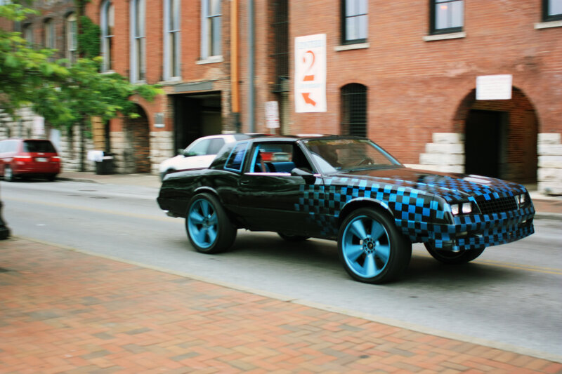 black car with blue checkered pattern