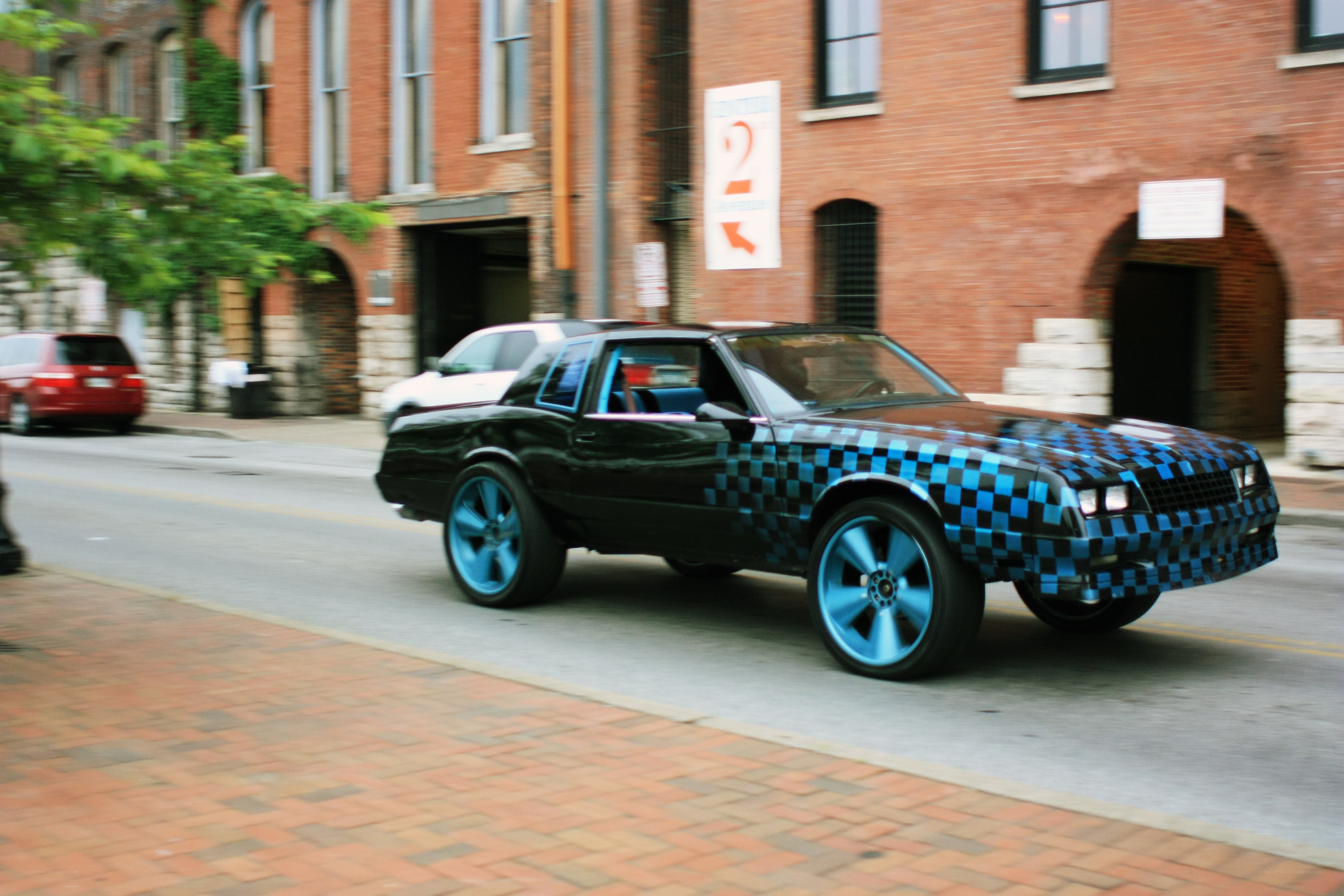black car with blue checkered pattern
