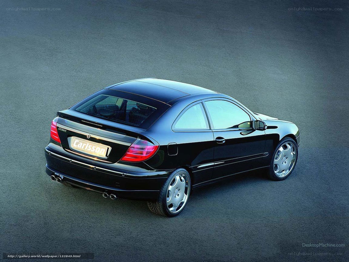 black car with carlsson badge