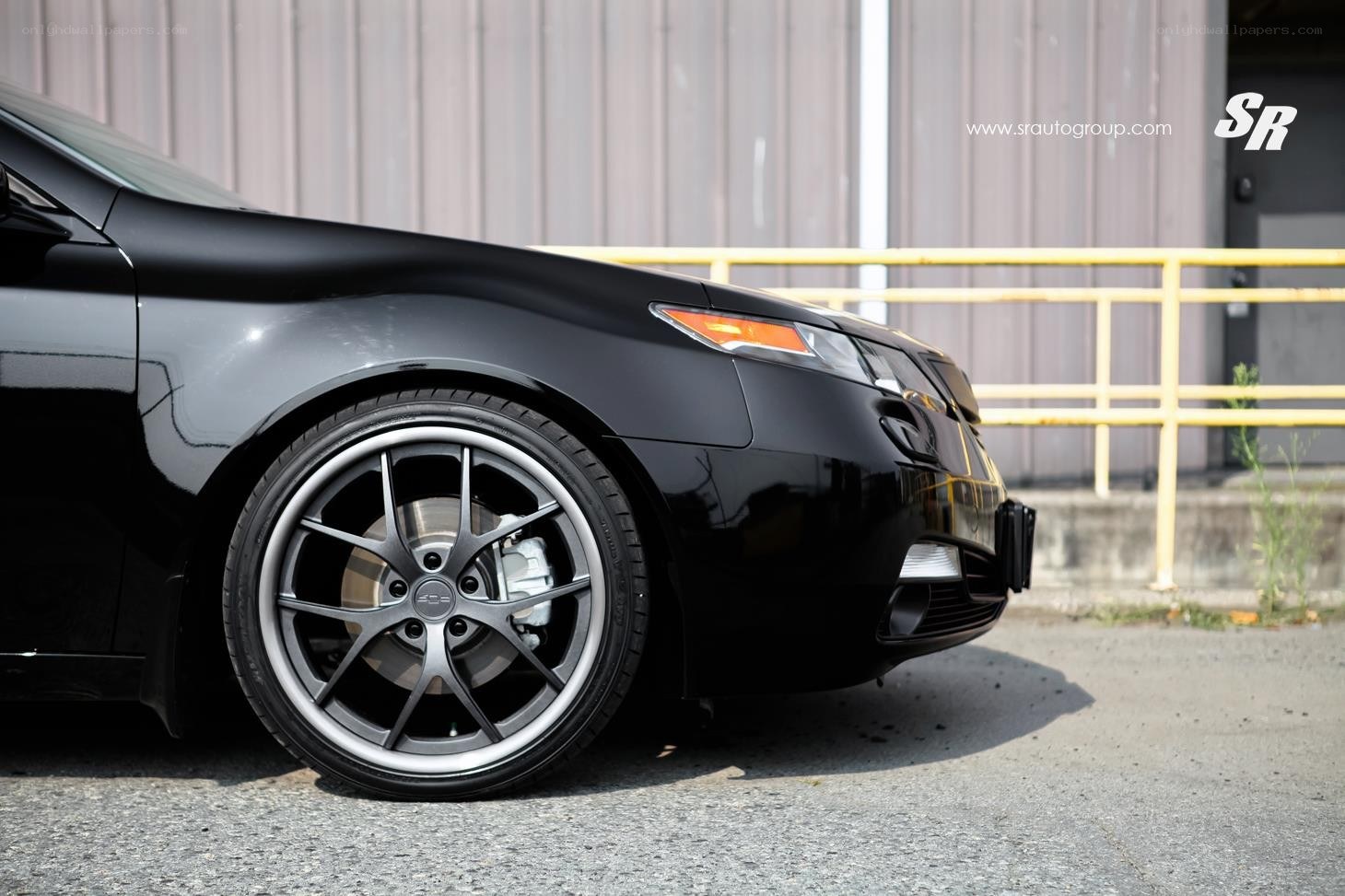 black car with custom wheels