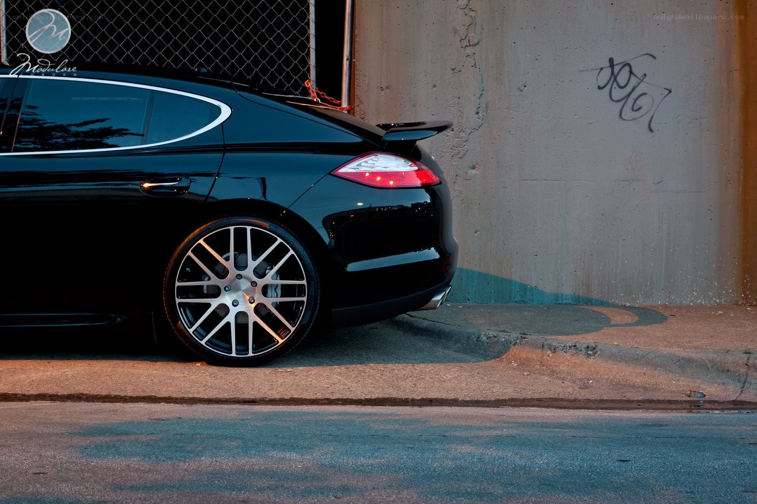 black car with custom wheels