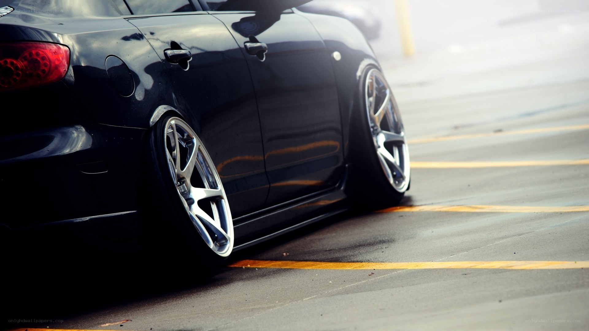 black car with custom wheels