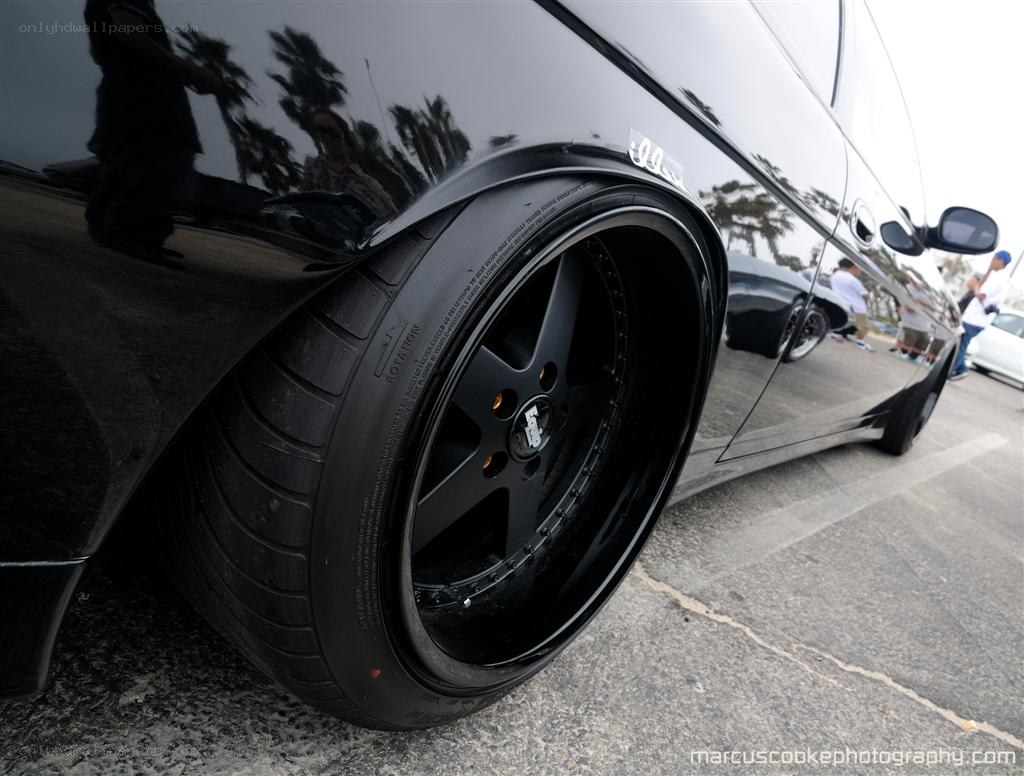 black car with custom wheels