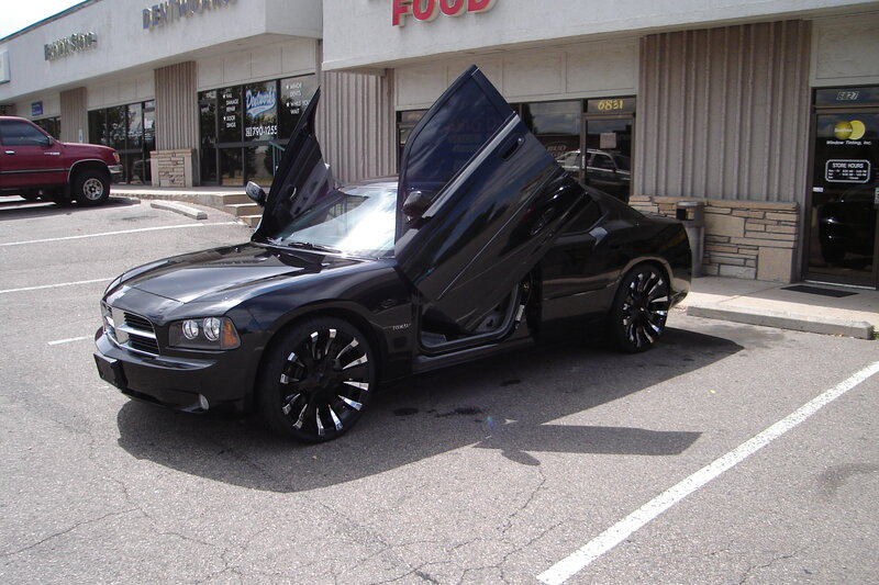Black car with doors open