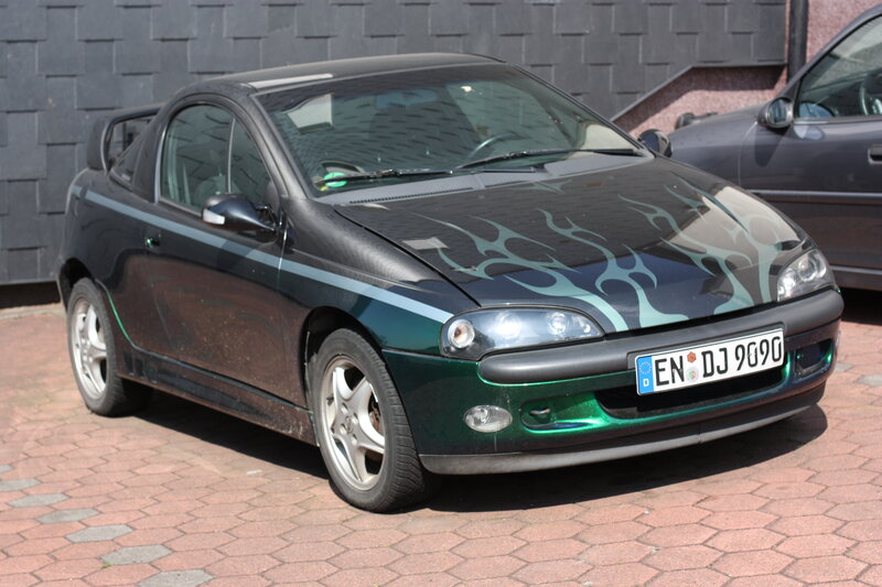 black car with flame decals