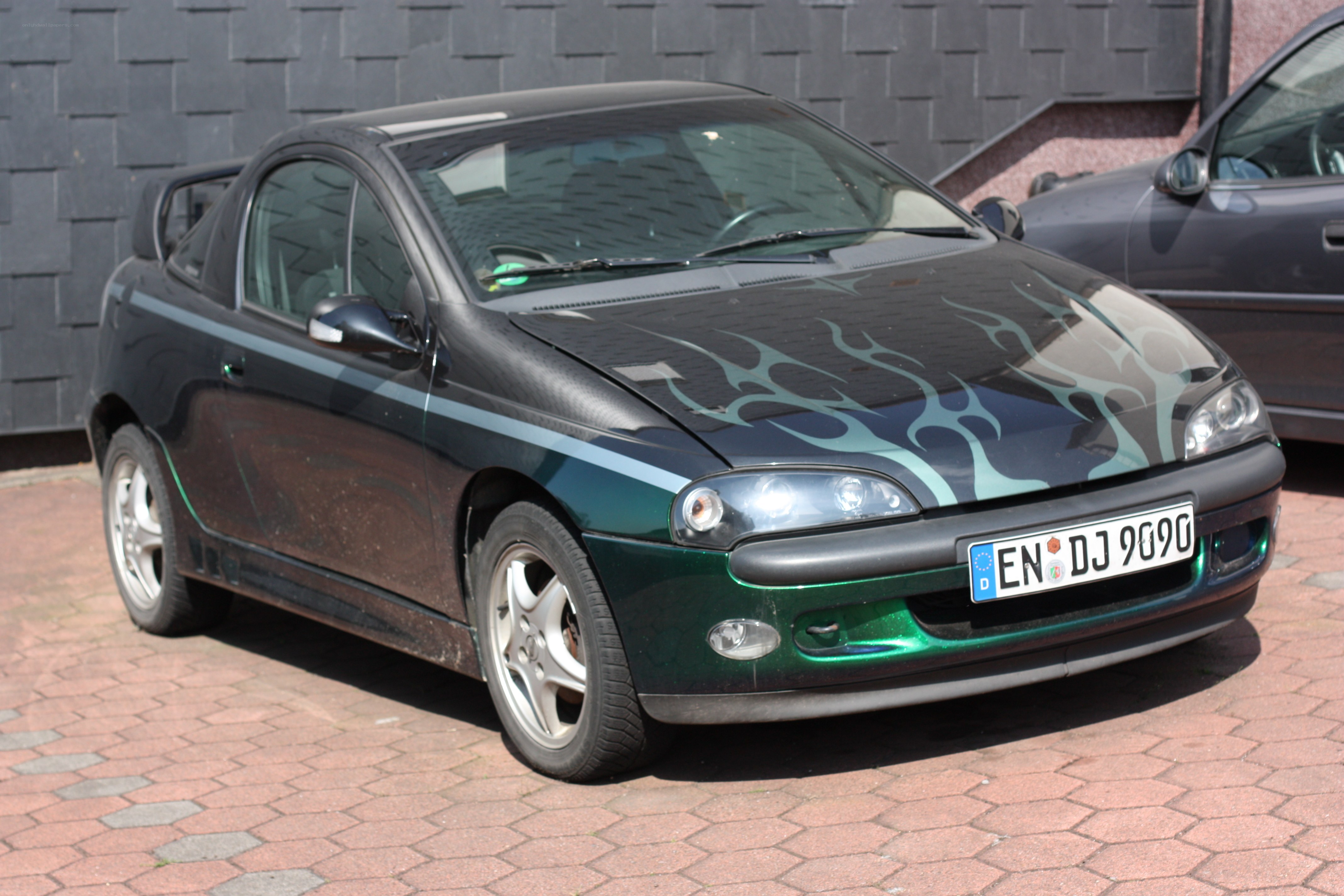 black car with flame decals