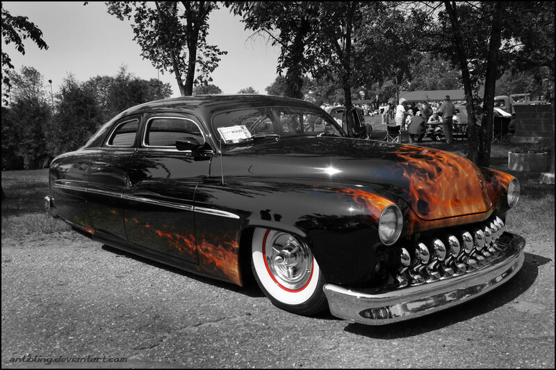 Black Car with Flame Design — Dramatic