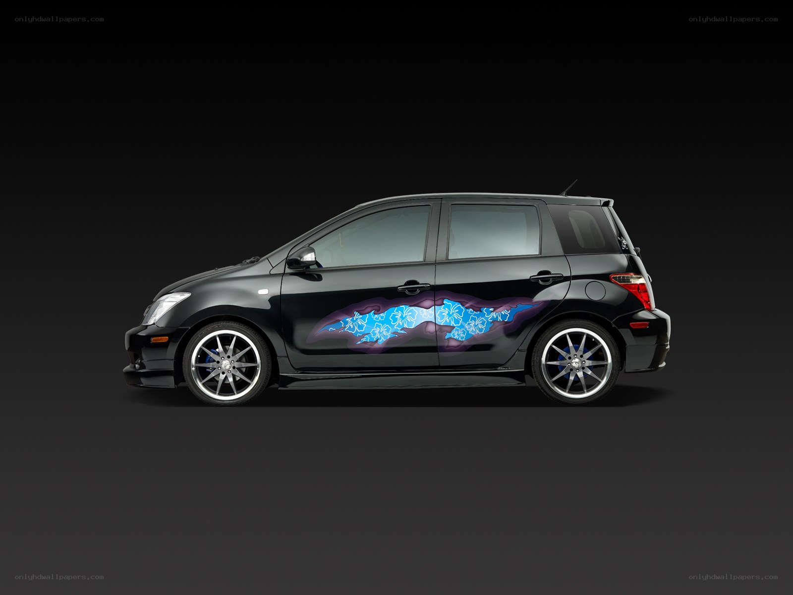 black car with floral design