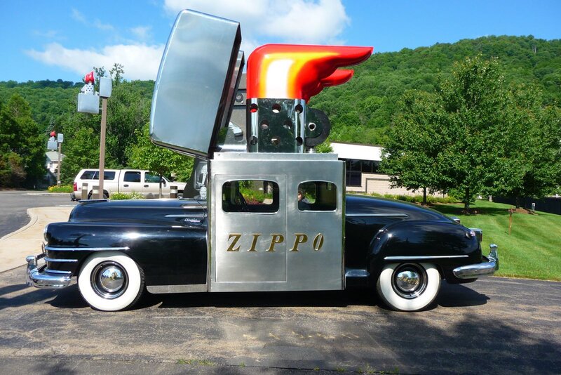 Black Car with Giant Lighter