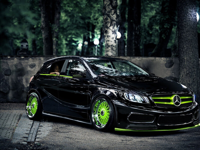Black Car with Green Accents — Dramatic
