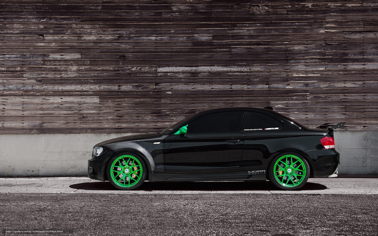 black car with green wheels