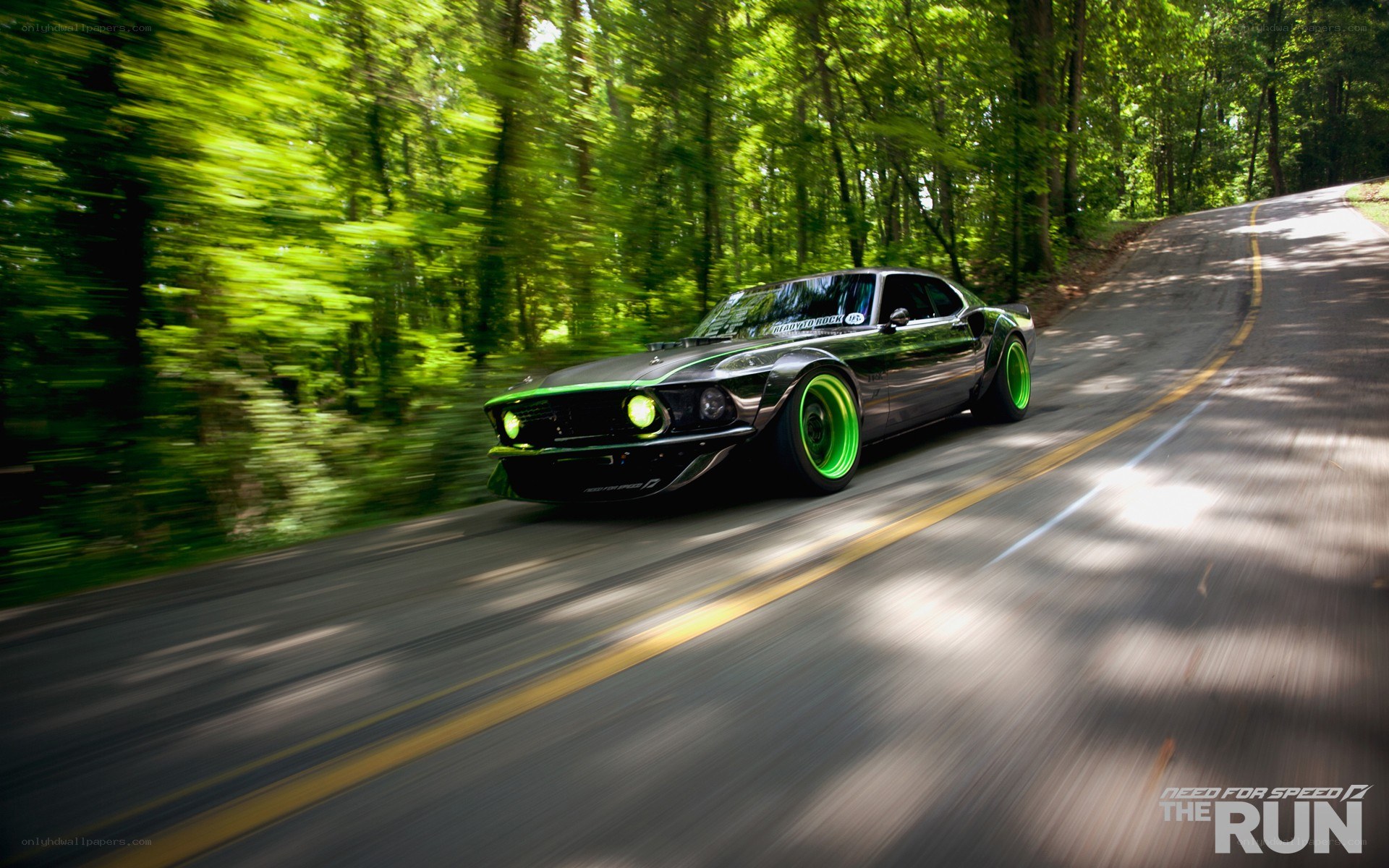 black car with green wheels