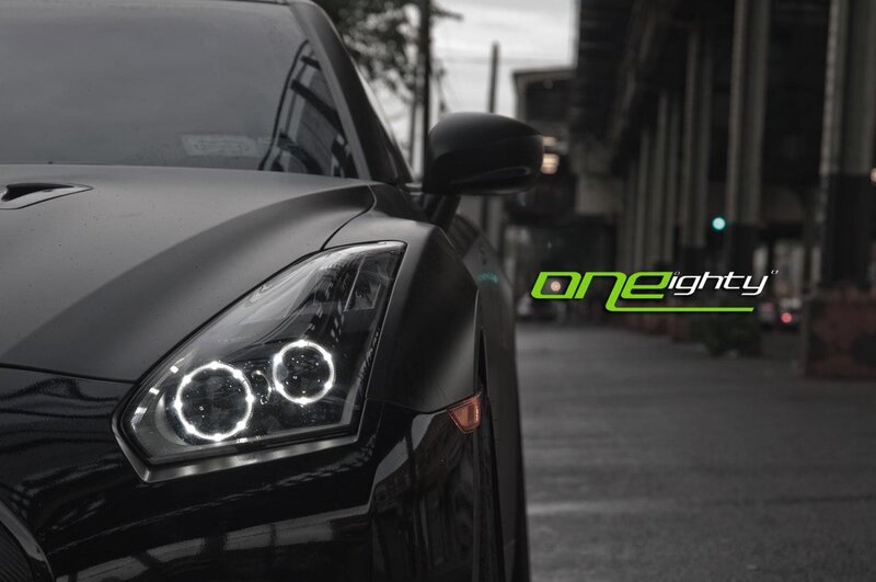 black car with halo headlights