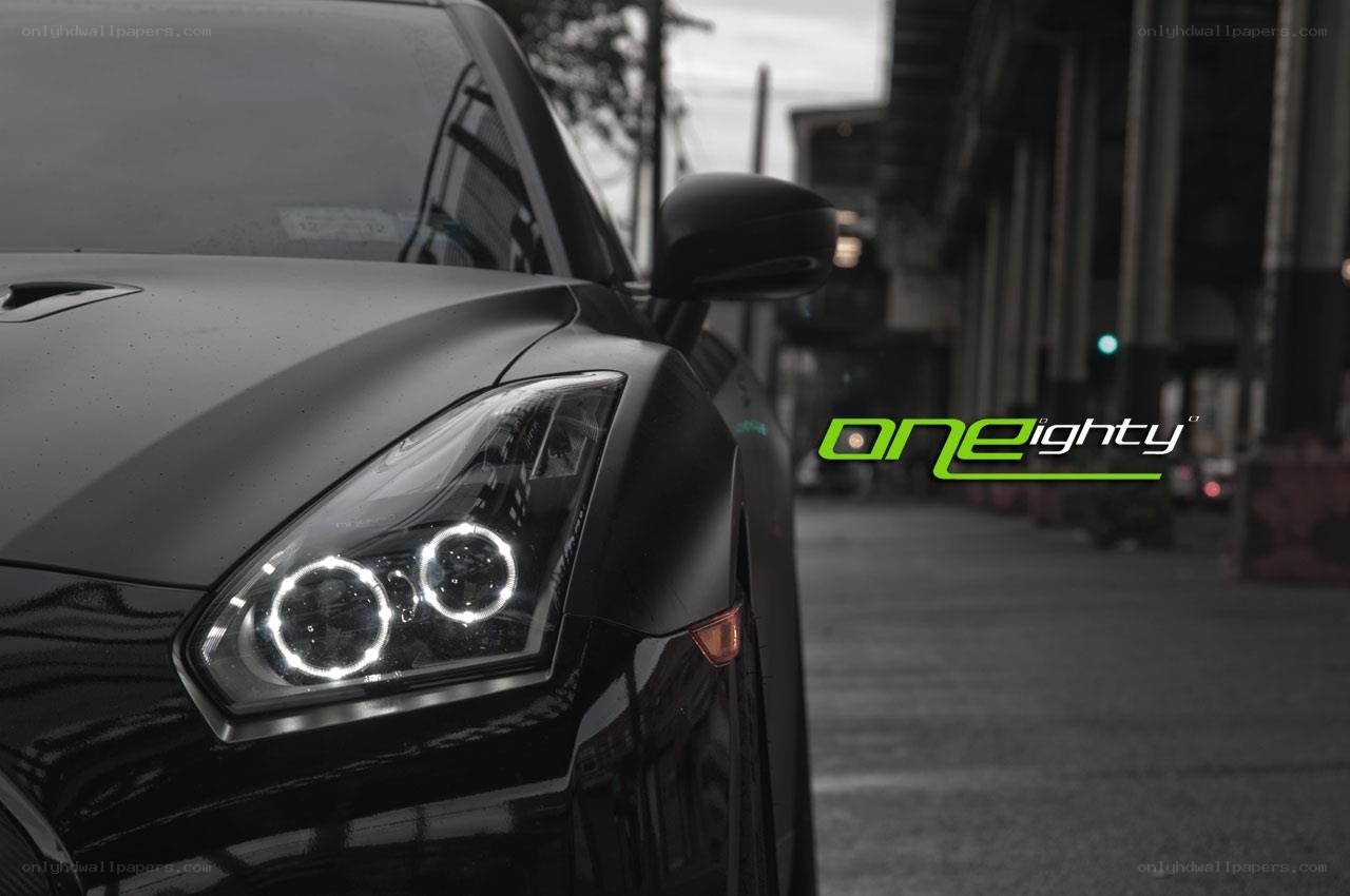 black car with halo headlights