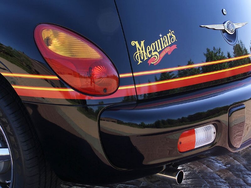 black car with Meguiar's decal