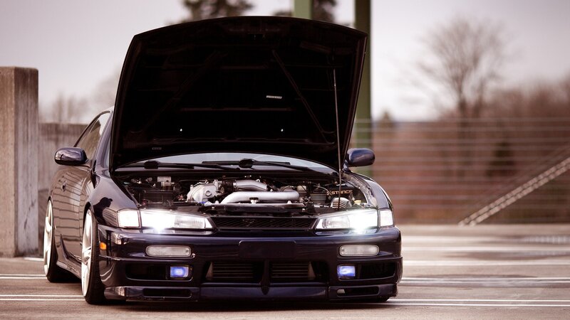Black Car with Open Hood — Dramatic