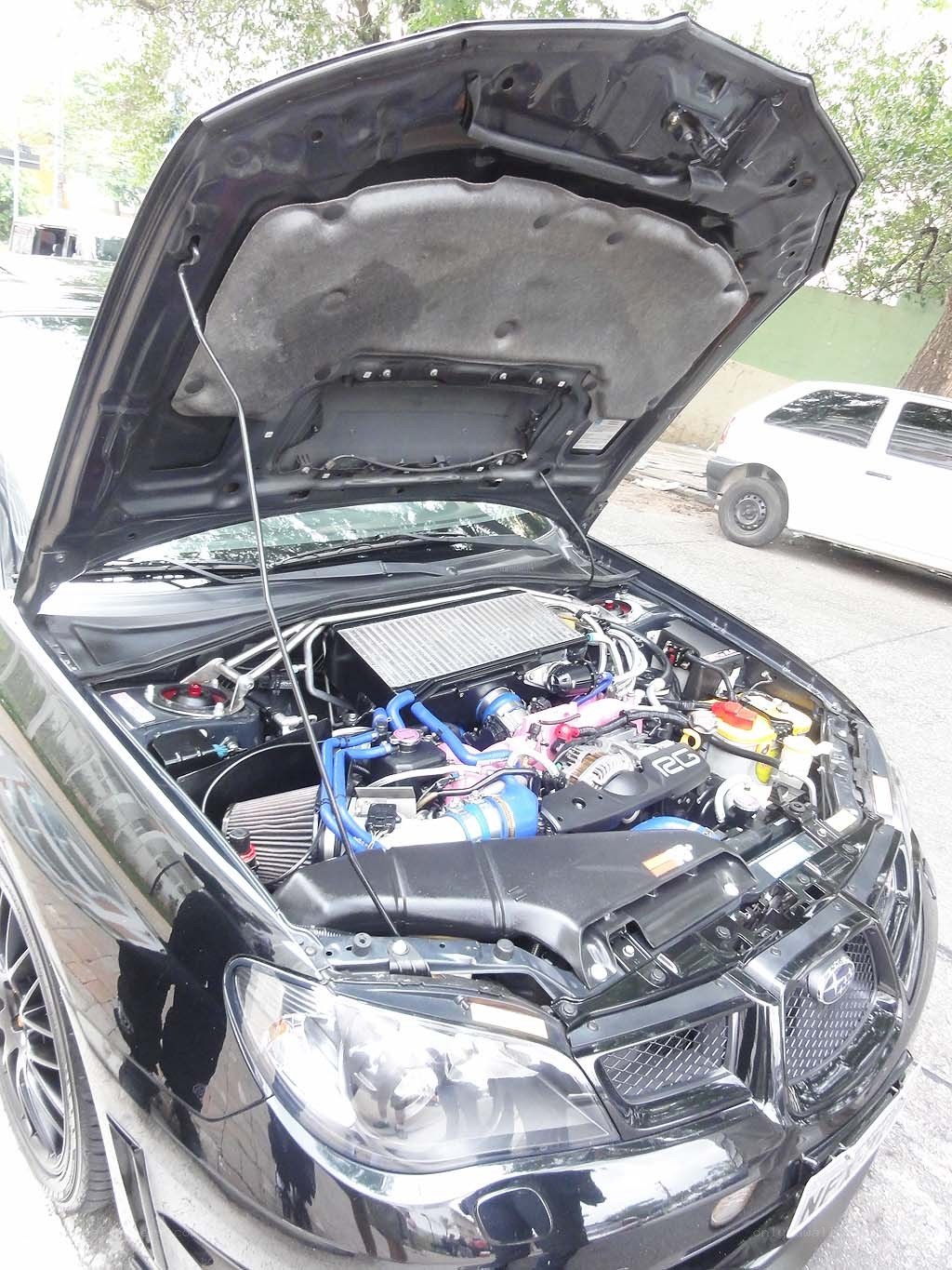 black car with open hood