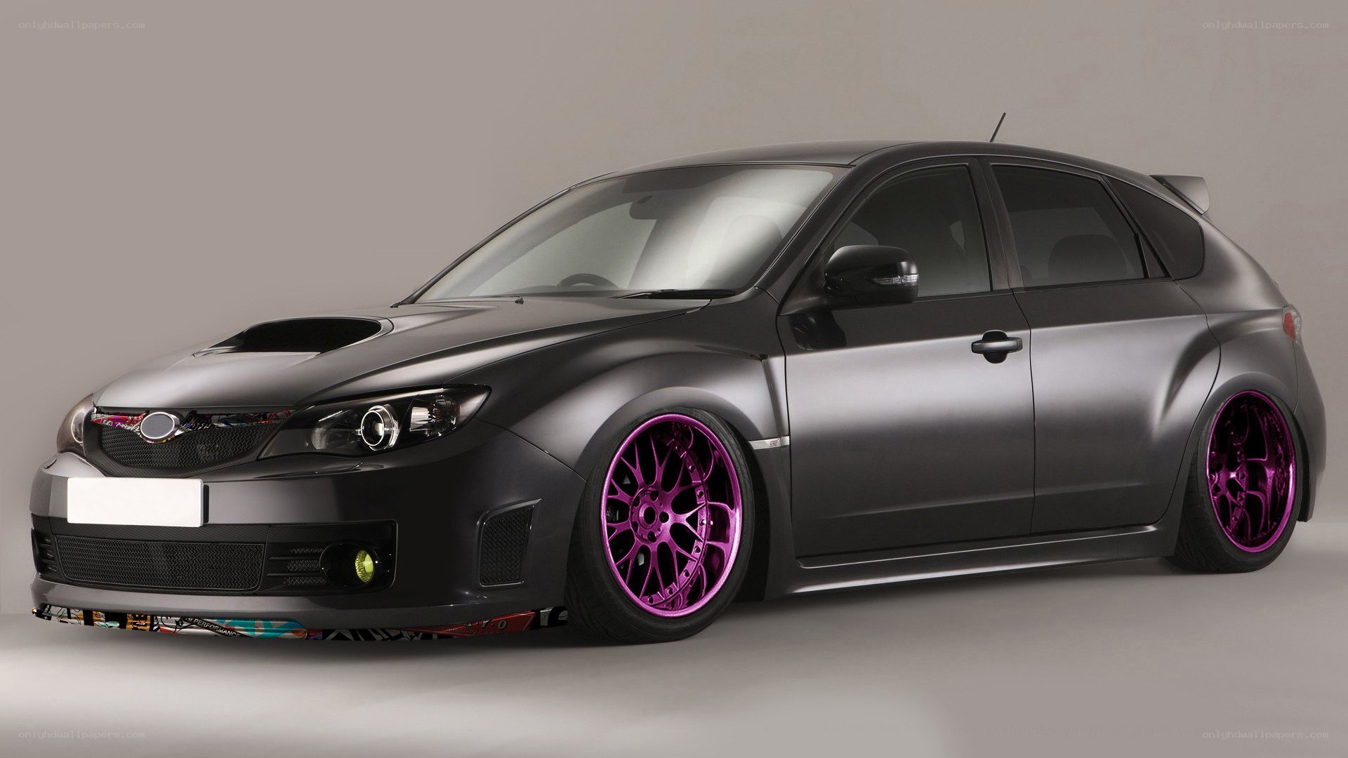 black car with purple wheels