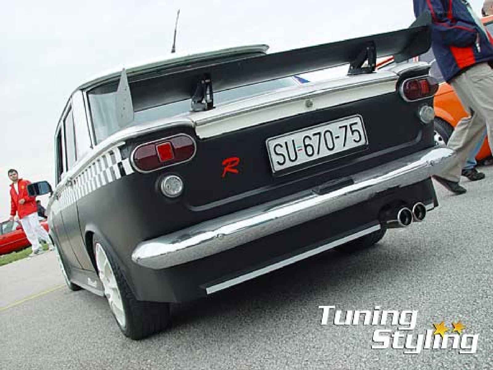 black car with rear spoiler