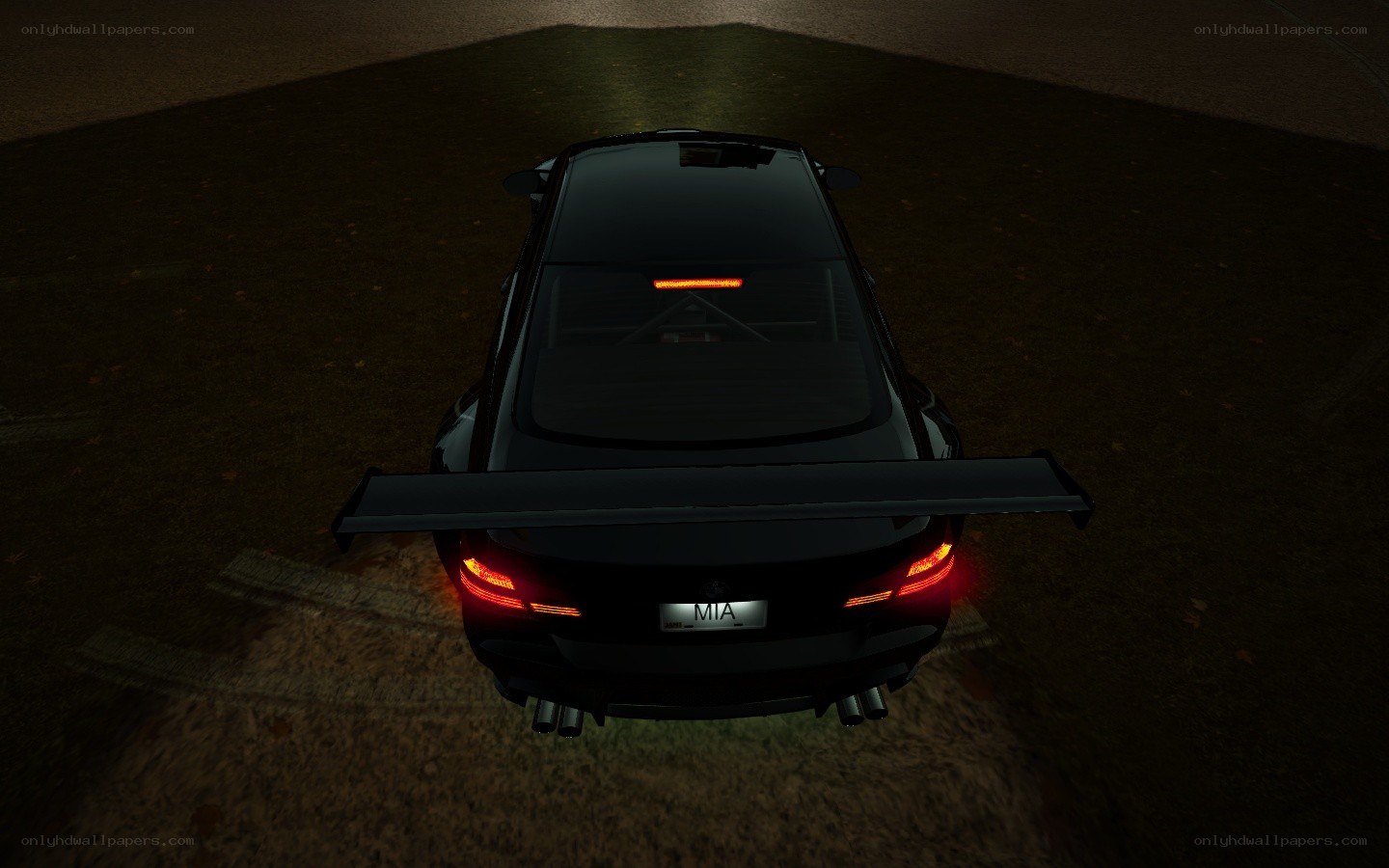 black car with rear spoiler