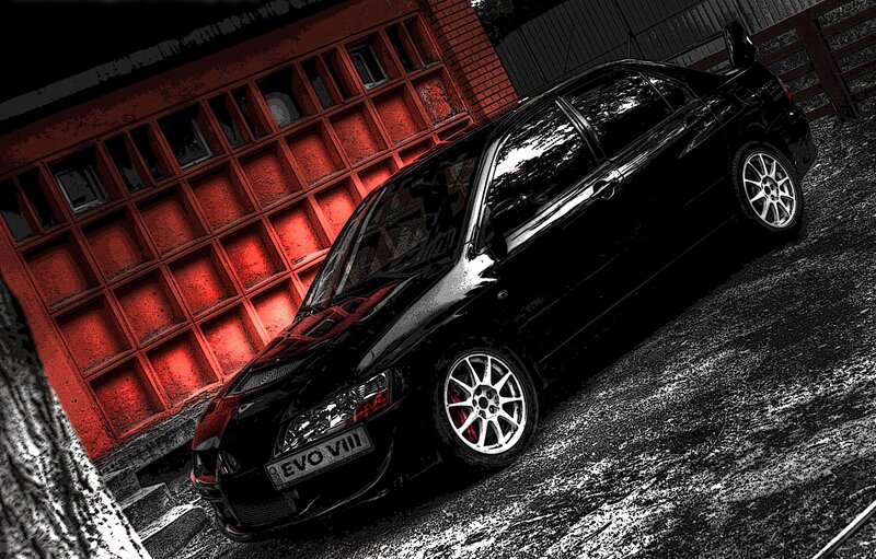 black car with red background