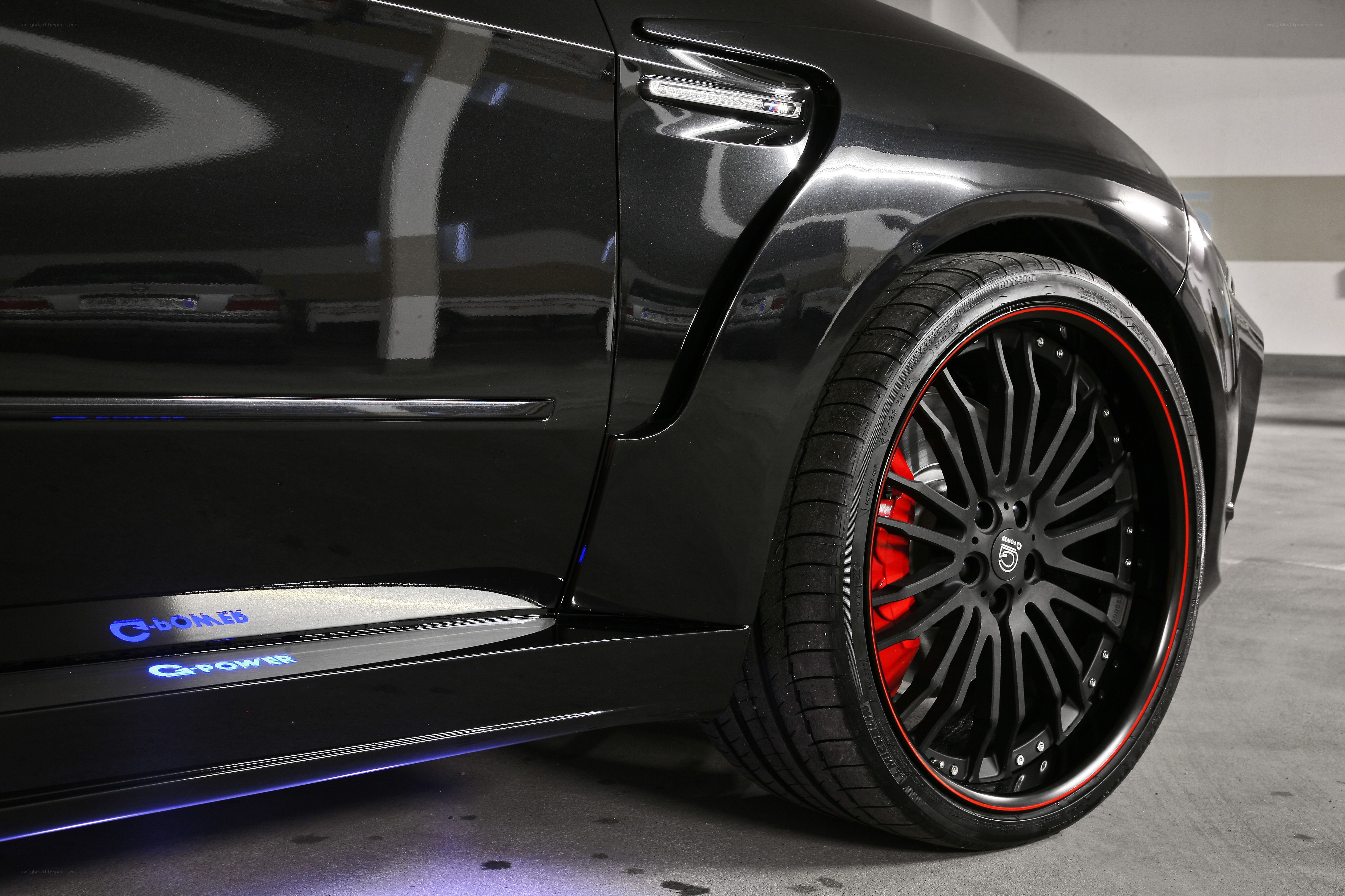 black car with red brake calipers