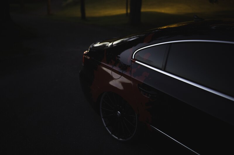 Black Car with Red Splatter