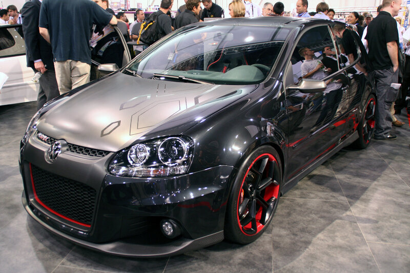 black car with red wheels