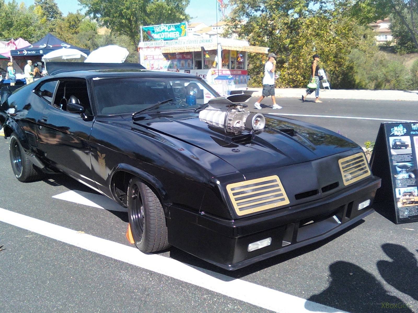 Black car with supercharged engine