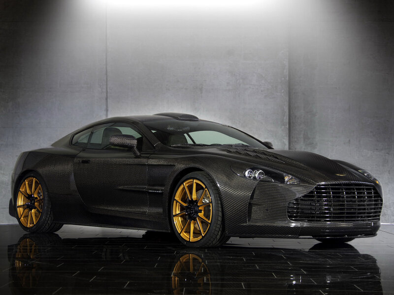 Black Carbon-fiber Car — Dramatic, Photograph, Gold Wheels, Concrete Wall