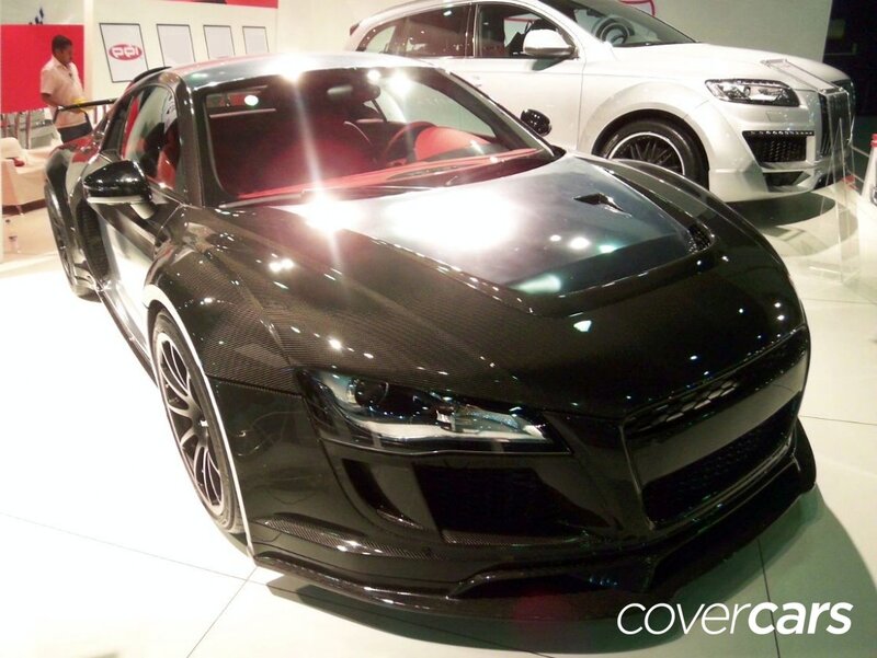 Black Carbon-fiber Sports Car — Showroom