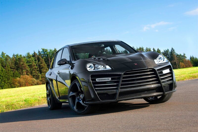 Black carbon-fiber SUV on road