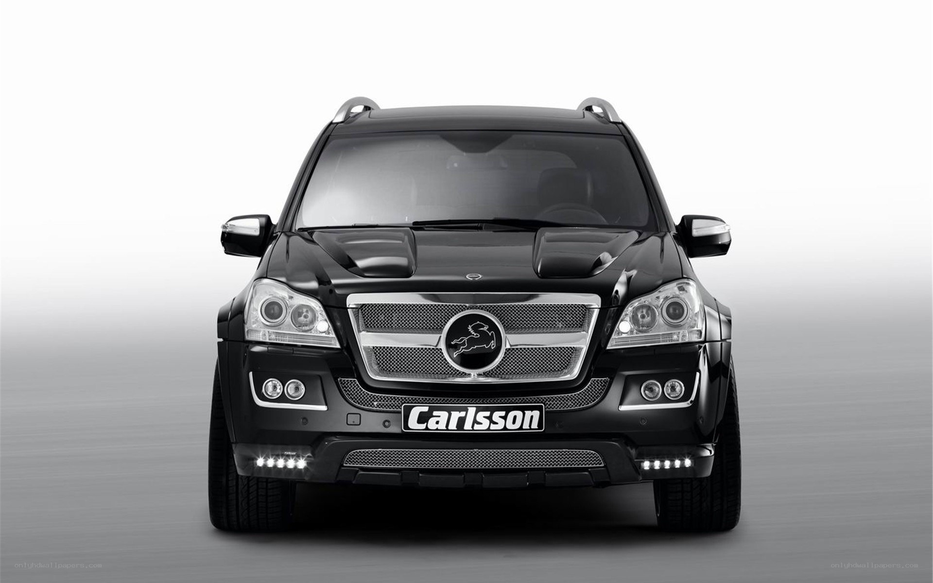 black carlsson suv front view