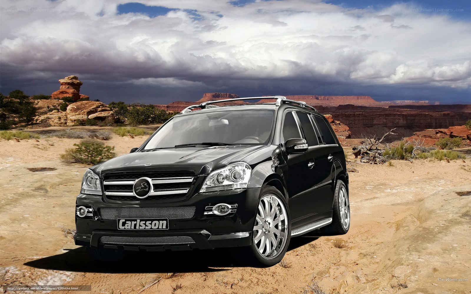 Black Carlsson SUV in desert
