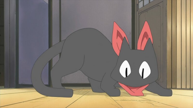 black cat with red ears