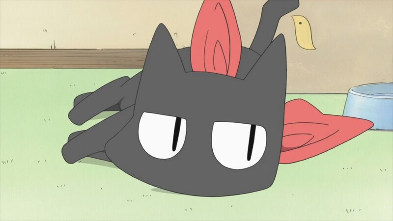 black cat with red ears