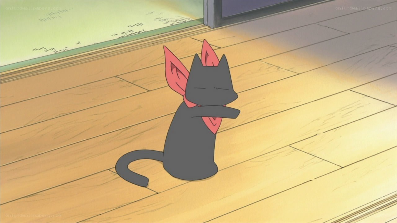 black cat with red ears