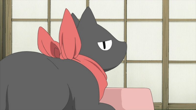 black cat with red scarf