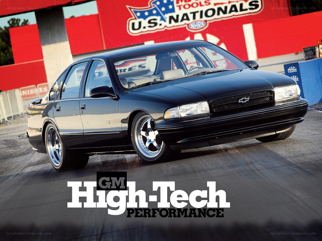 Black Chevrolet at a drag strip